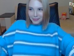 pretty shemale cutie with blue sweater tugging her tiny cock