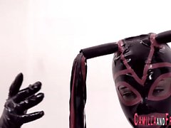 Latex tranny fucks slave