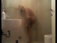 Big-titted blonde showering and getting blown